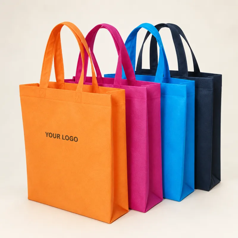 U-cut non-woven bags in orange, pink, blue and navy with a printed logo