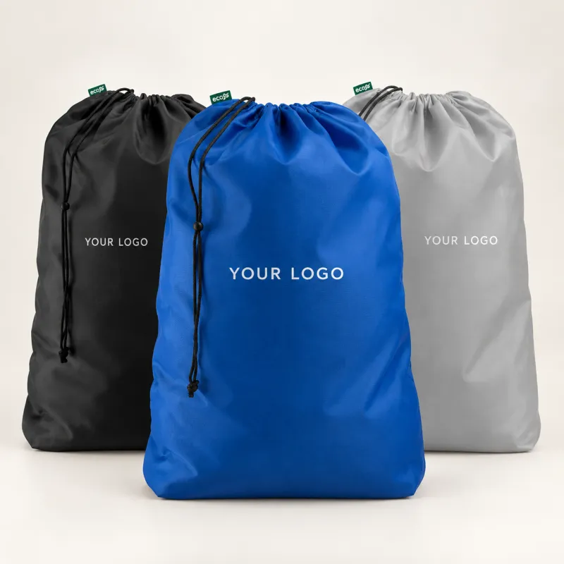 Three drawstring laundry bags in black, blue and grey