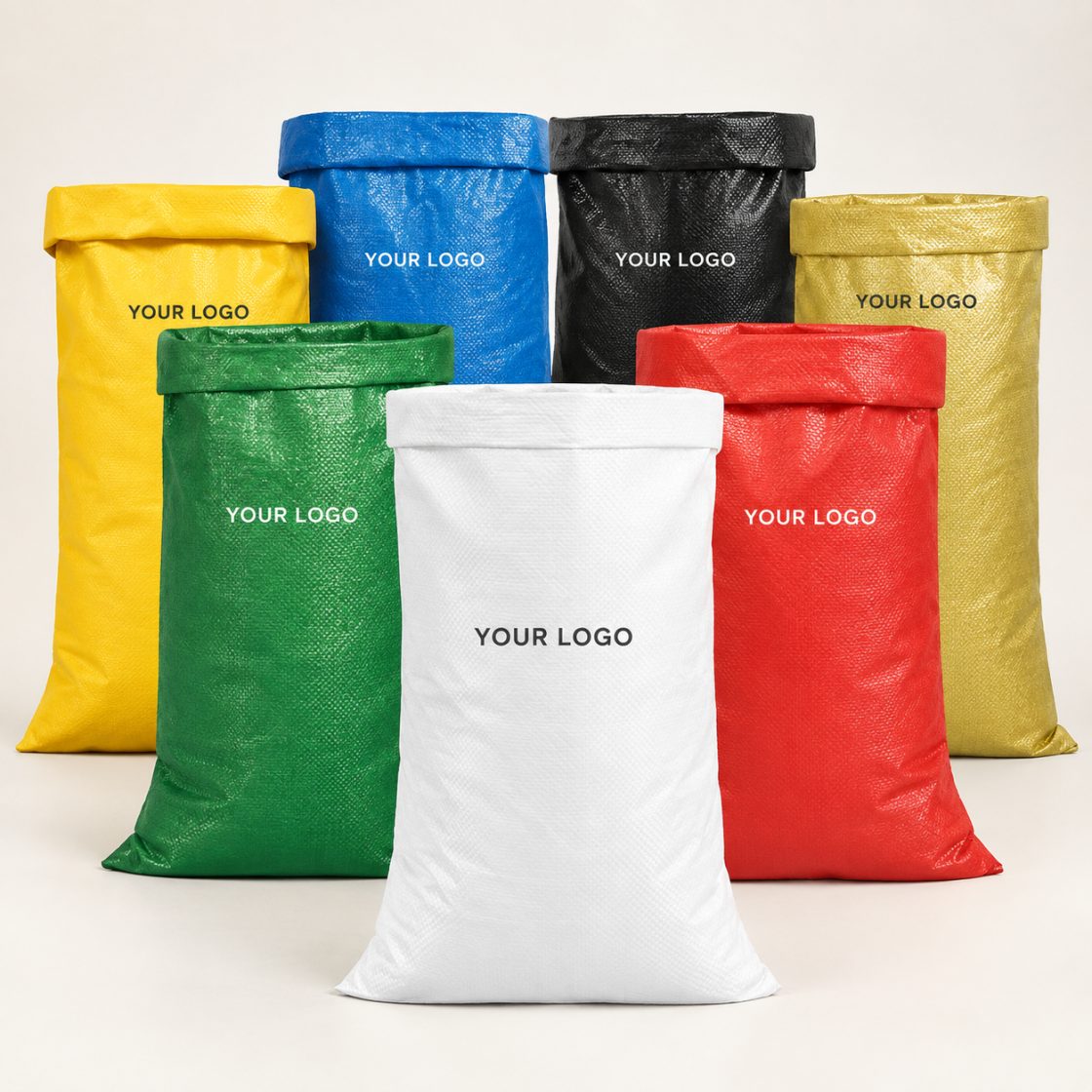 Seven woven polypropylene sacks in yellow, blue, black, gold, green, white and red